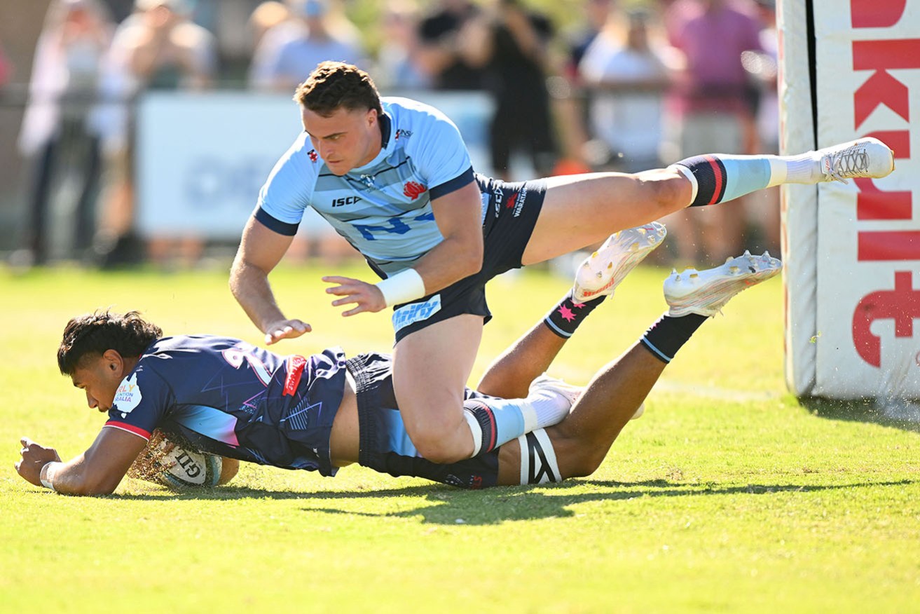 Daniel Maiava scores a try for Melbourne Rebels in the Super Rugby Pacific trial match against NSW Waratahs.
