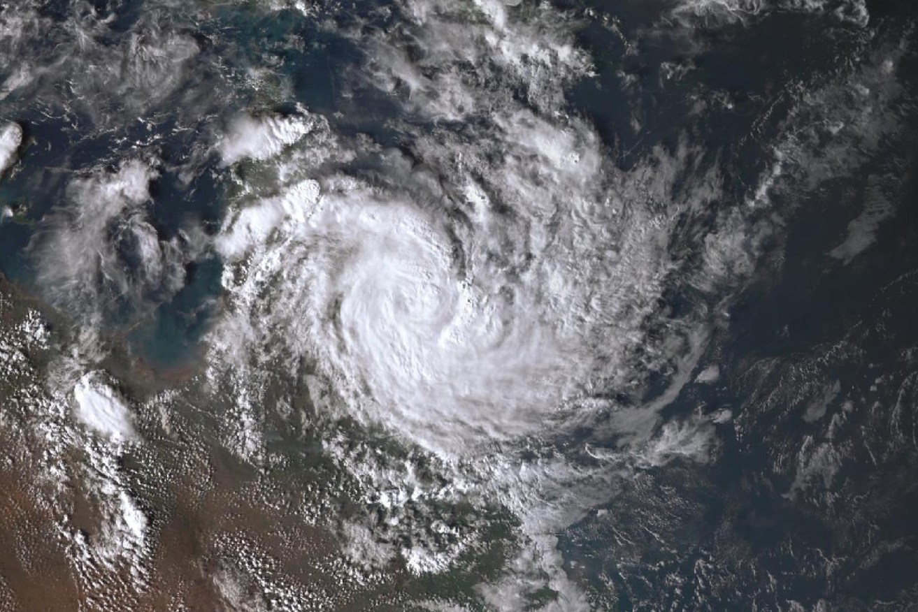 Cyclone Megan is gathering strength over tropical on its way to a Territory landfall.