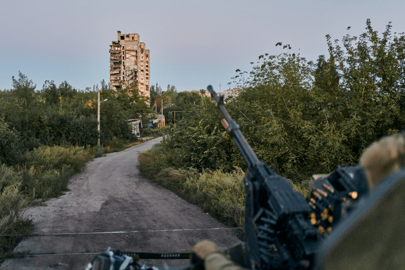 The road back from the front lines, where Ukrainian defenders are short on ammunition.