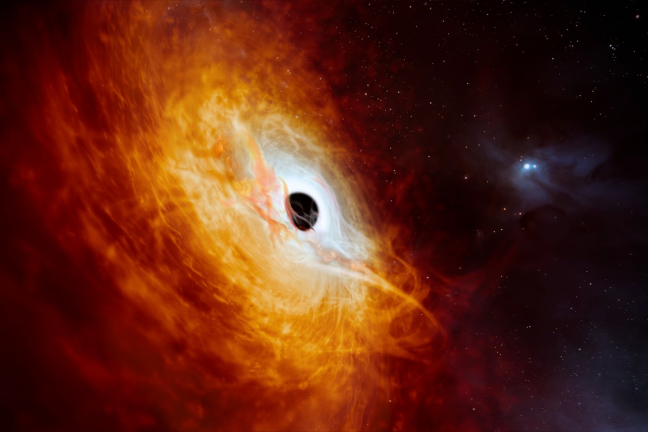 The record-breaking quasar J0529-4351, the bright core of a distant galaxy.