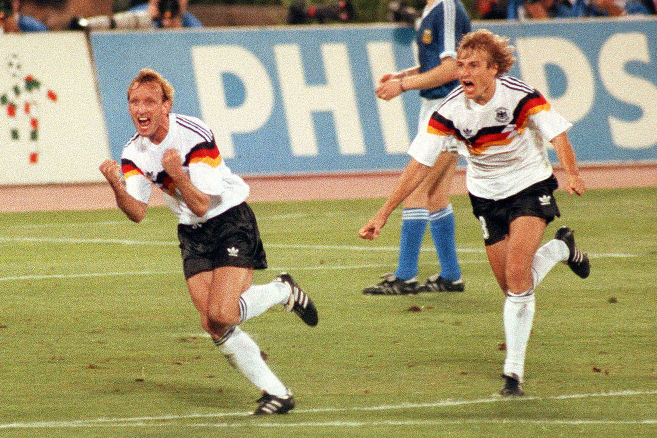 Andreas Brehme and Jürgen Klinsmann in Rome’s Olympic Stadium after Brehme scored his penalty in the 1990 World Cup final.  