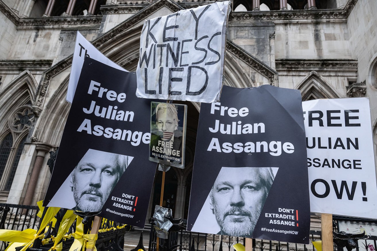 Julian Assange's supporters have gathered outside London's High Court as the legal battle unfolds.