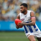 North Melbourne sacks Tarryn Thomas after 18-game ban from AFL