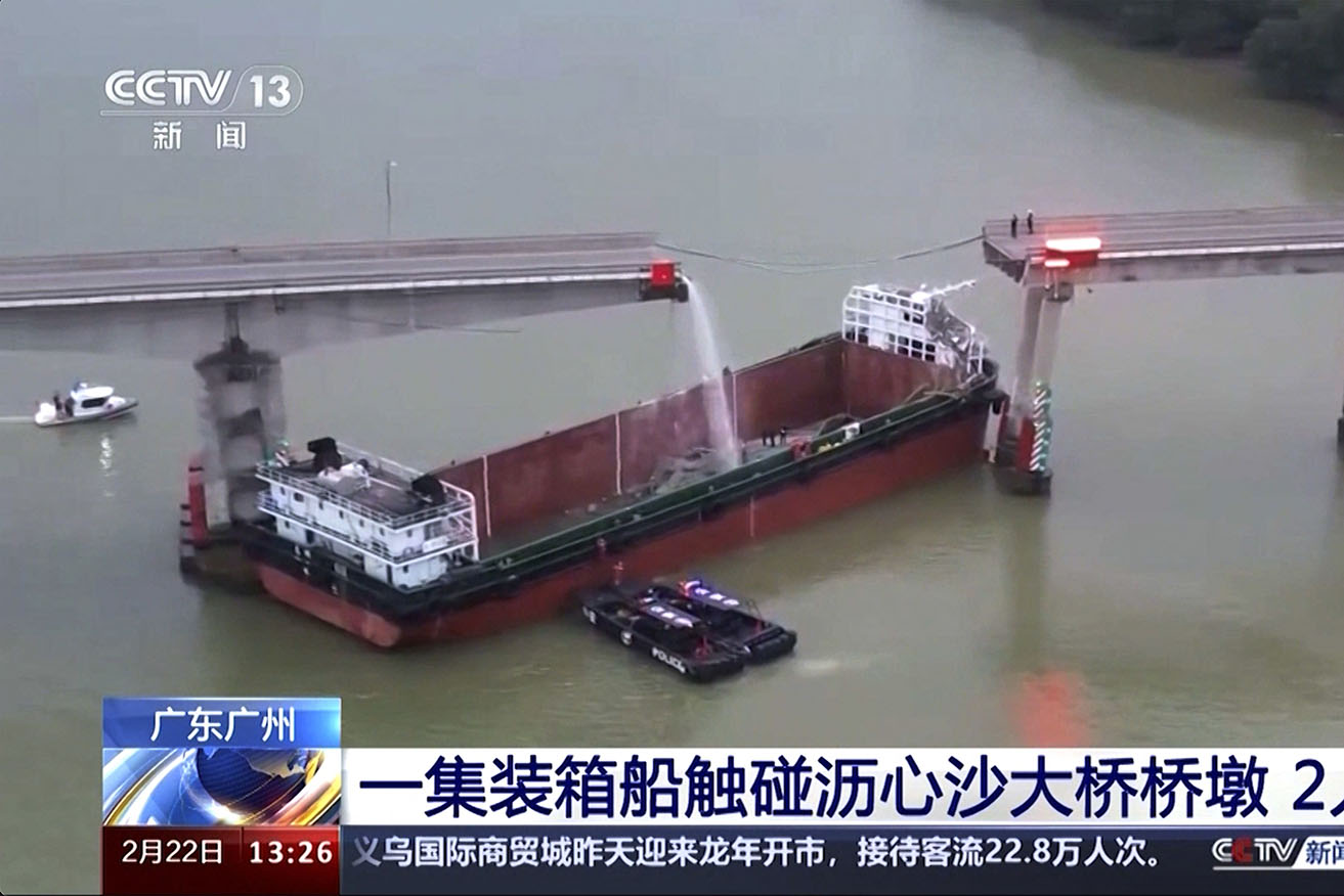 A barge has hit a bridge in China, plunging a bus and another vehicle into the water.