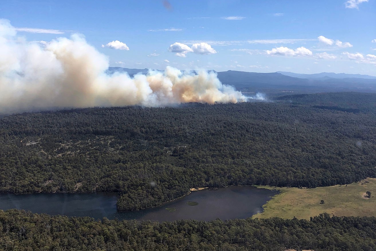 Out-of-control bushfires are threatening communities in Tasmania and Victoria.