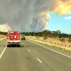 Property losses as huge bushfire set to rage for days
