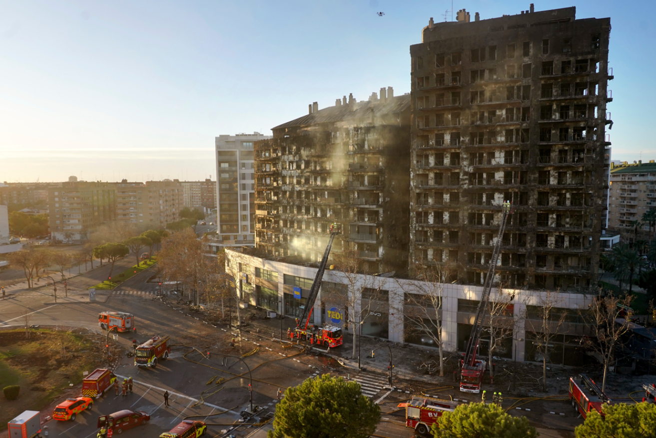 The burnt-out husk of the Valencia hotel in which nine people lost their lives.
