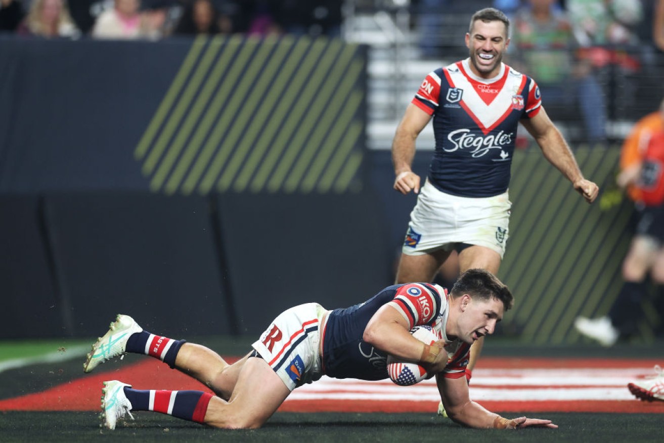Victor Radley of the Roosters scores a try during the round one NRL match between Sydney Roosters and Brisbane Broncos in Las Vegas.