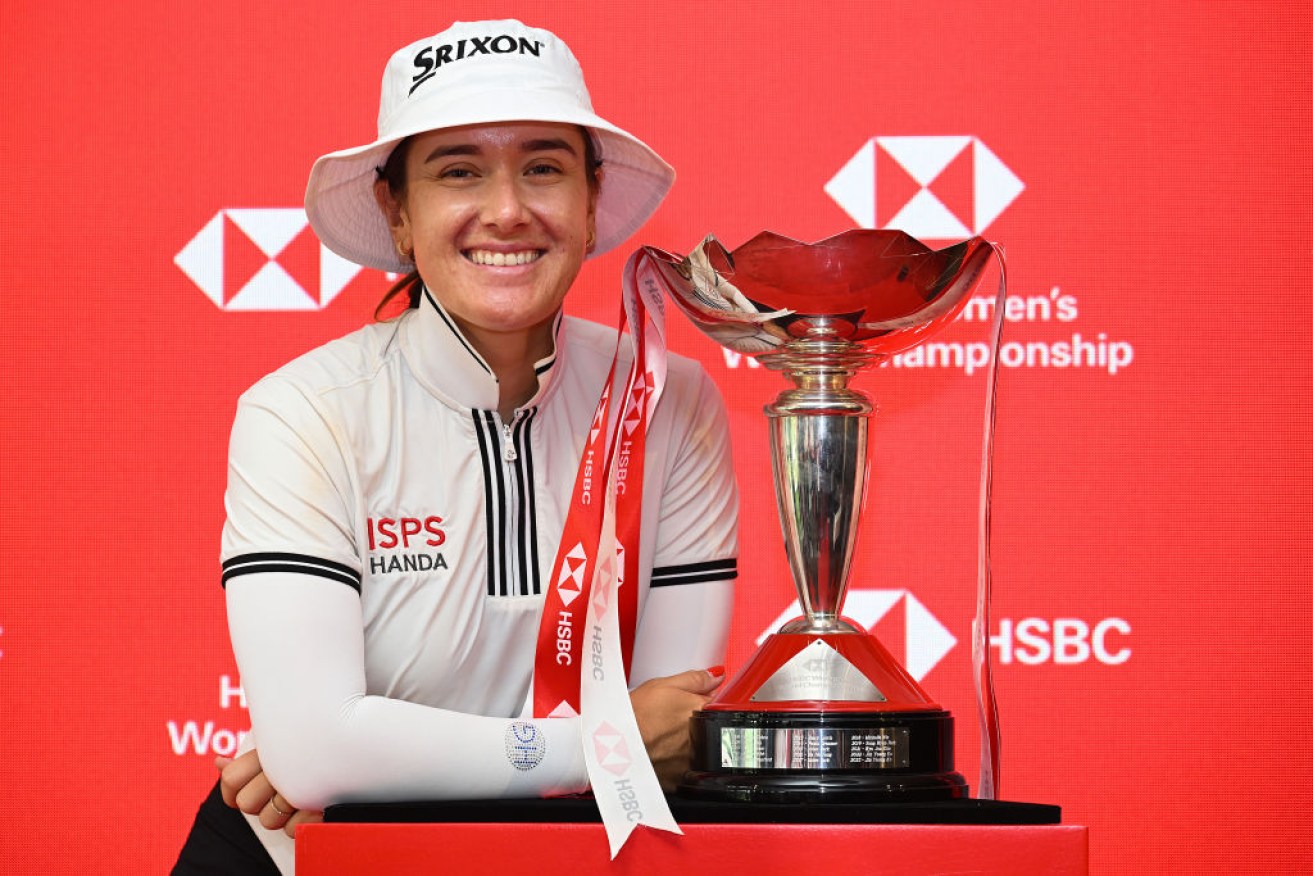 Hannah Green poses with the trophy following victory in the HSBC Women's World Championship in Singapore on Sunday. 