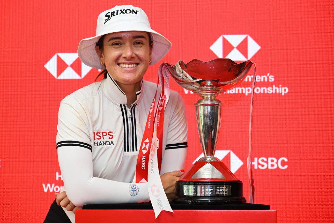 Hannah Green poses with the trophy following victory in the HSBC Women's World Championship in Singapore on Sunday.