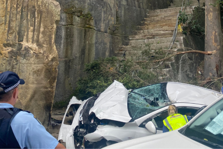 Man freed, hospitalised after car goes off city cliff
