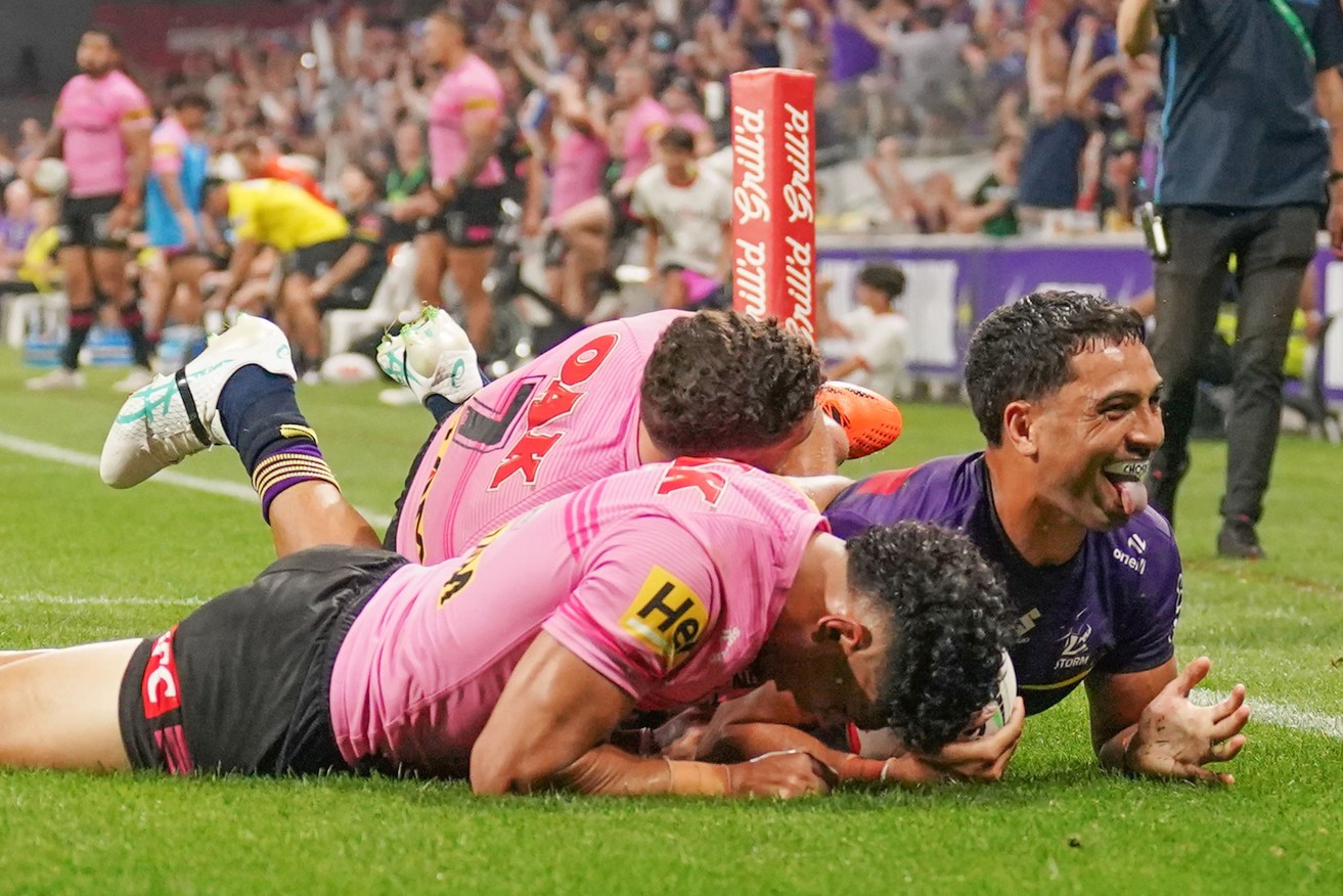Reimis Smith of the Melbourne Storm scores the only try during the NRL Round 1 match between the Melbourne Storm and the Penrith Panthers. 