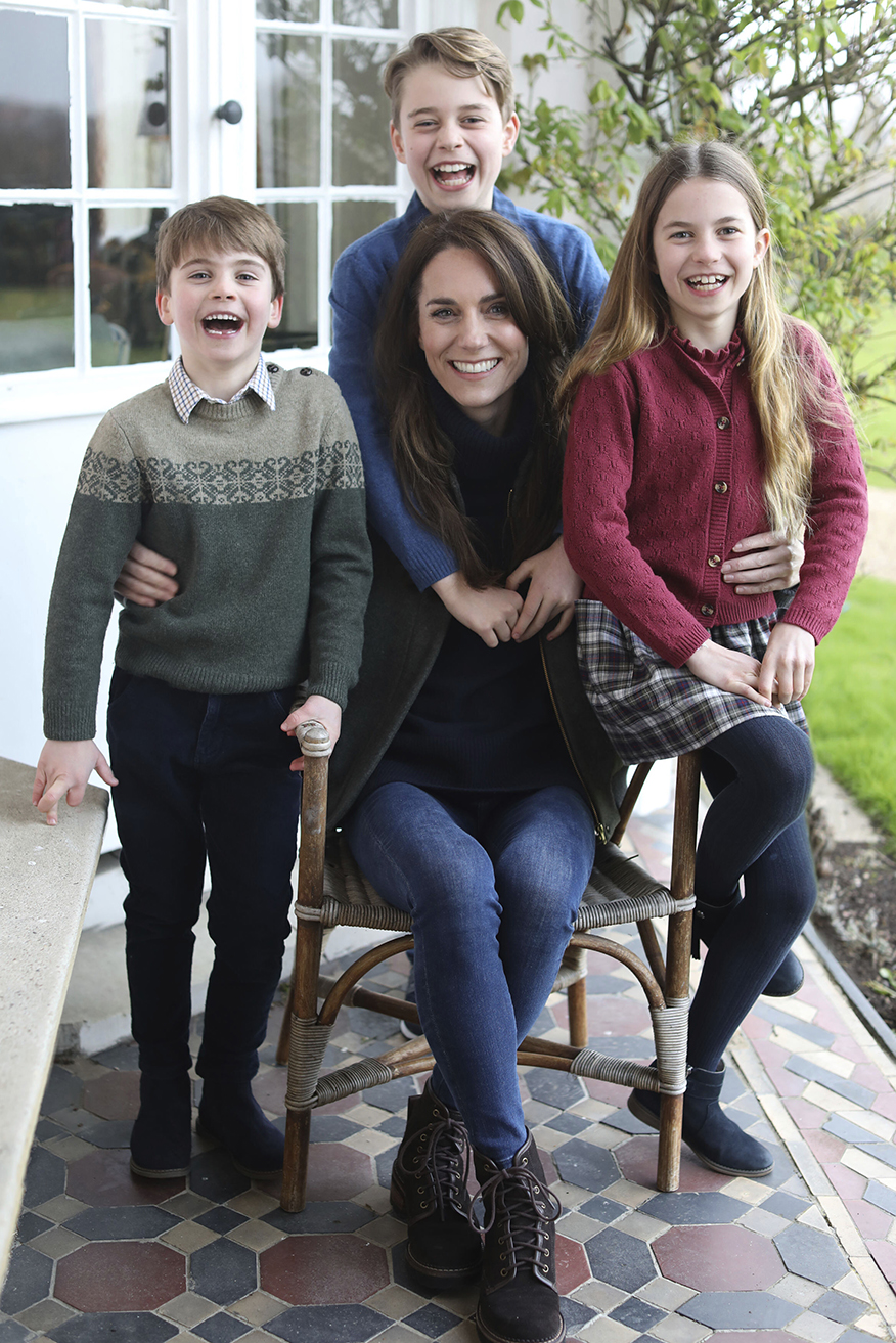 The undated photo issued on Sunday shows Kate, Princess of Wales with Prince Louis, Prince George and Princess Charlotte at Windsor.