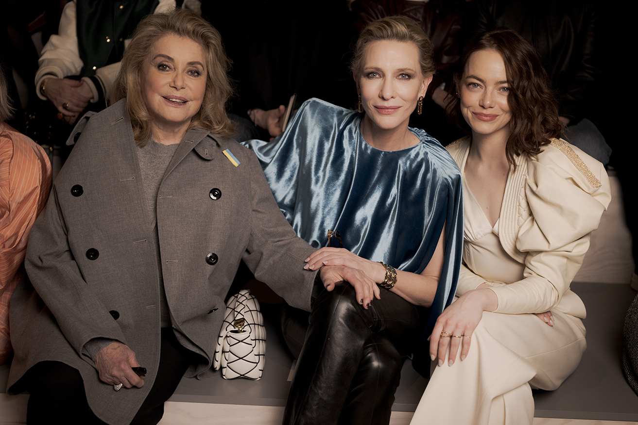 Cate Blanchett, flanked by Catherine Deneuve and Emma Stone at Paris Fashion Week on March 5, says she does not feel "regret or shame" when she sees how she has aged.