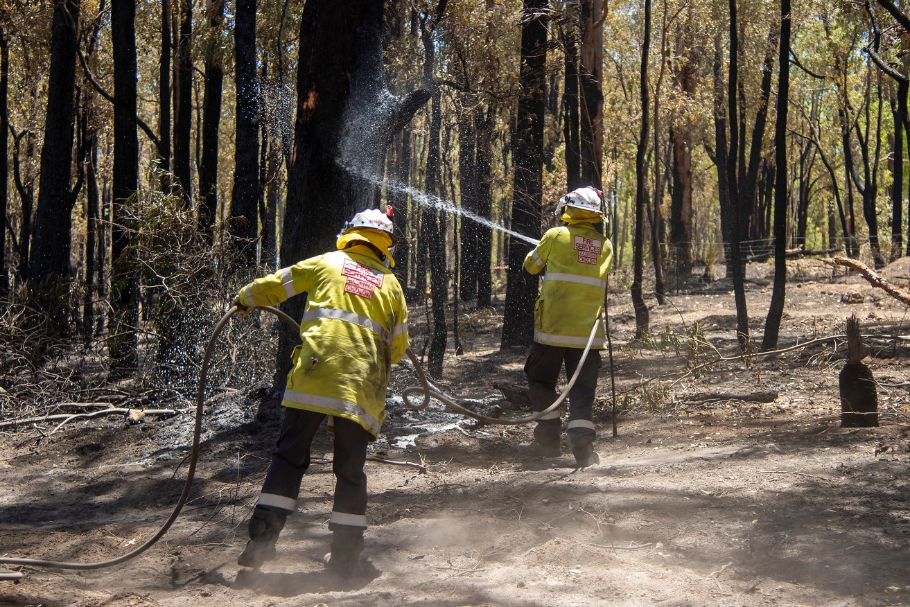 The alert level for a bushfire south of Perth has been downgraded to watch and act.