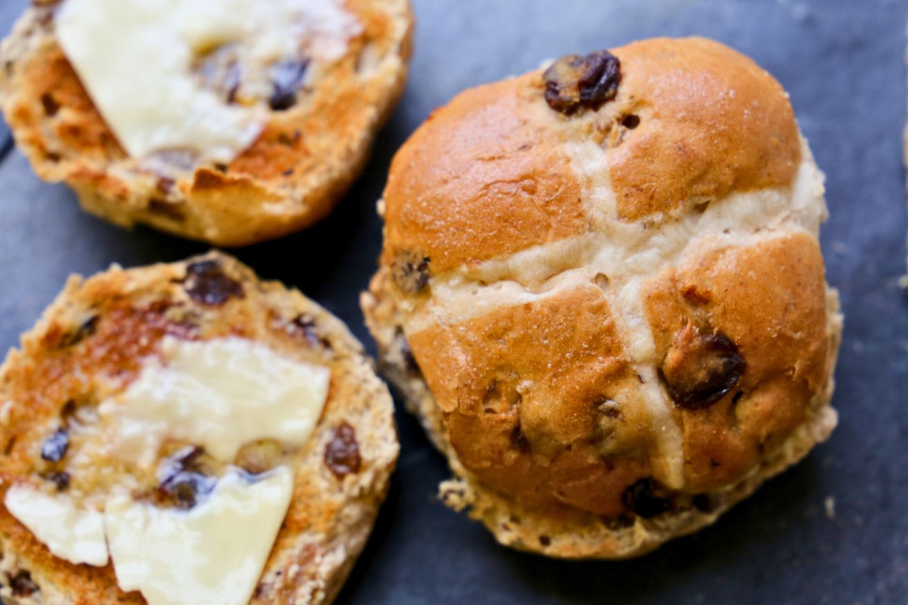 A good hot cross bun just needs a slathering of butter to be perfect.
