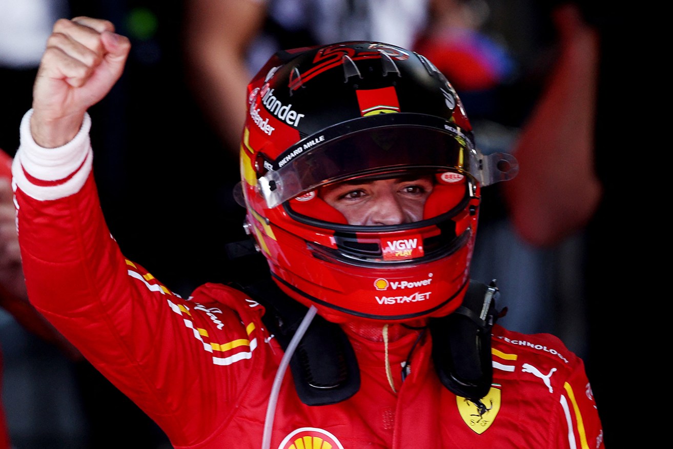 Ferrari's Spanish driver Carlos Sainz Jr celebrates victory after the Australian Formula One Grand Prix at Albert Park in Melbourne on Sunday. 