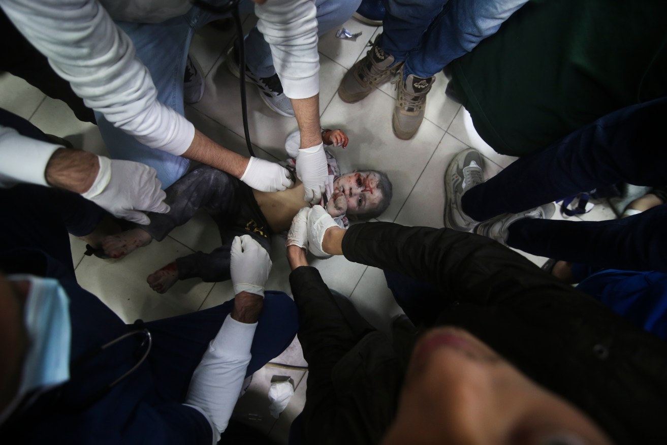 Palestinian medics are operating under heavy fire as two Gaza hospitals are besieged by Israel. 