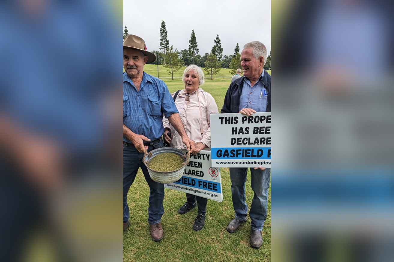 Ian and Margot Ladner and Al McVinnish were among dozens of Queensland farmers protesting in Toowoomba on Monday about a coal seam gas project.