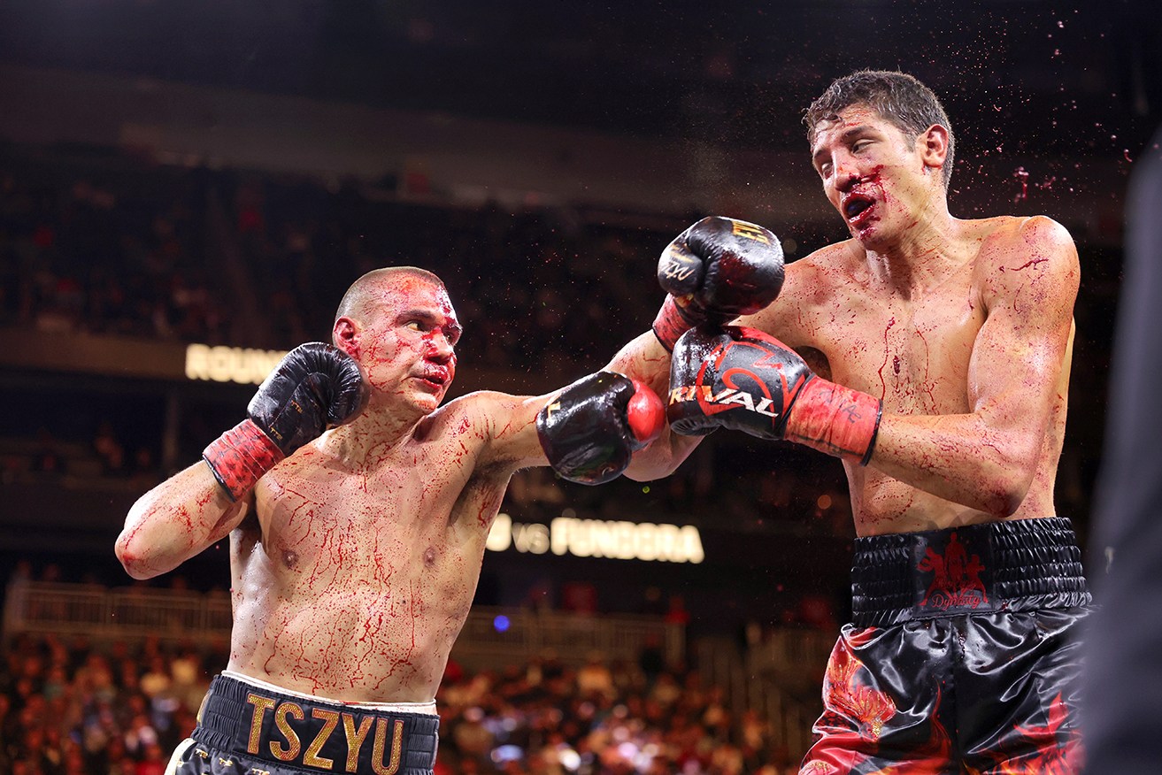 Tim Tszyu and Sebastian Fundora have gone toe to toe in a bloody battle in Las Vegas on Sunday.