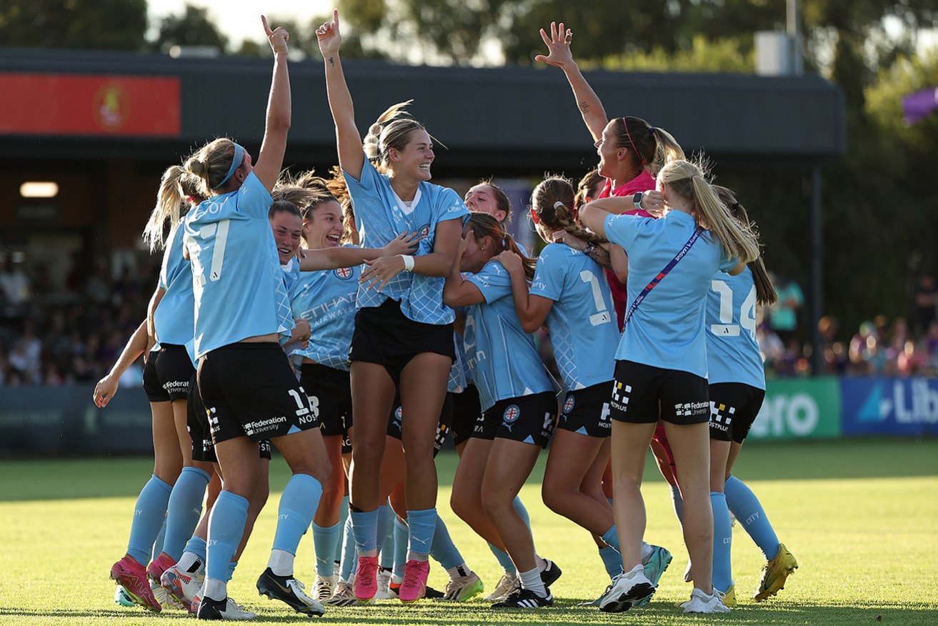 Melbourne City players celebrate winning the A-League Women premiers plate in Perth on Sunday.  