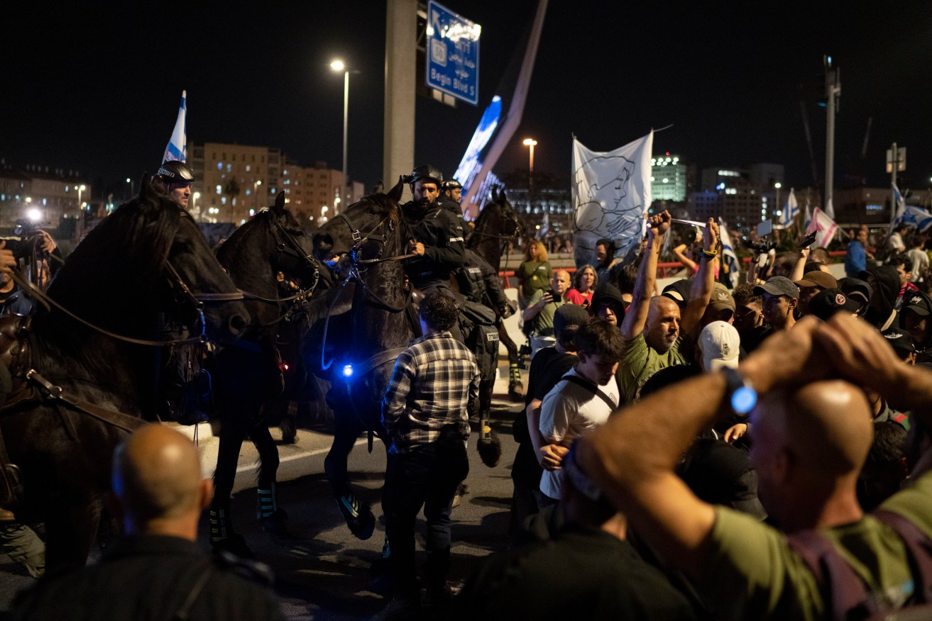 Police control part of a protest against Israeli Prime Minister Benjamin Netanyahu's government.