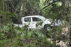 Man dies in floodwaters as heavy rain lashes Qld