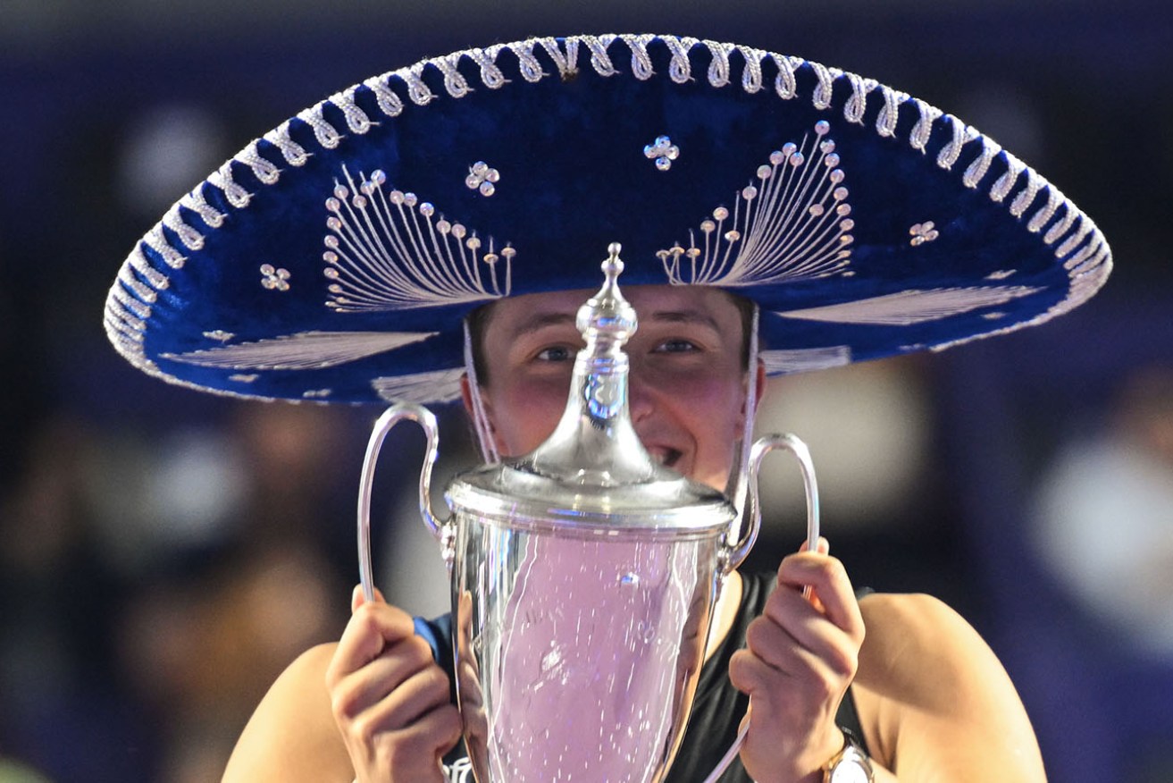 Iga Swiatek celebrates her win at the WTA finals in Cancun in November. 