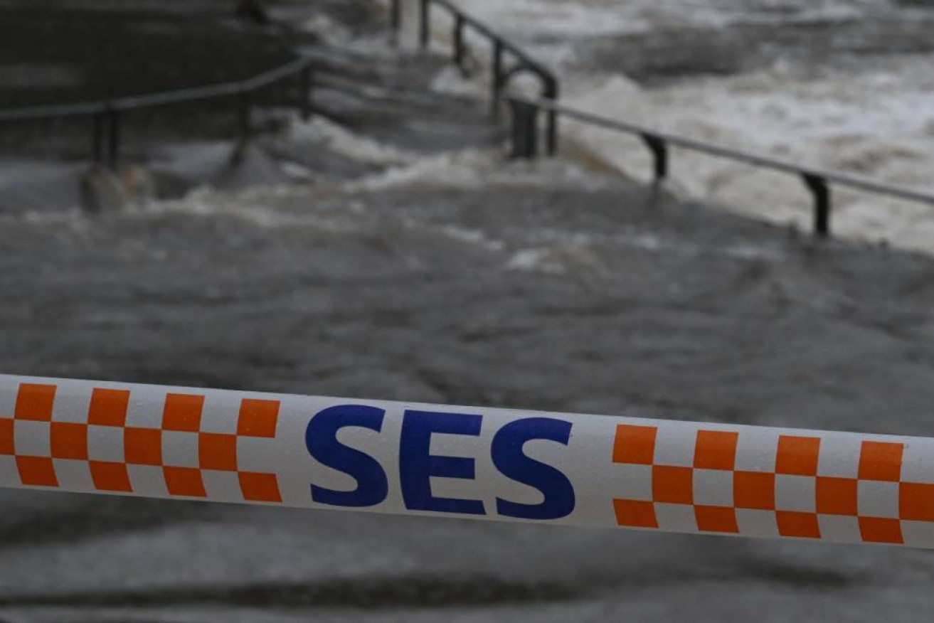 Floodwaters inundate the Parramatta Ferry Wharf in Parramatta, Sydney, Friday, April 5