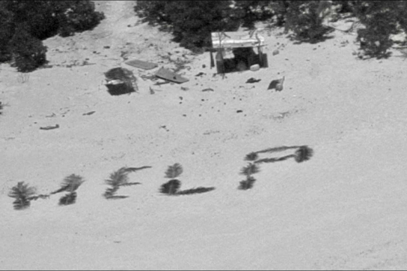 Three stranded mariners shaped palm fronds into a message for help spotted by a US navy aircraft.
