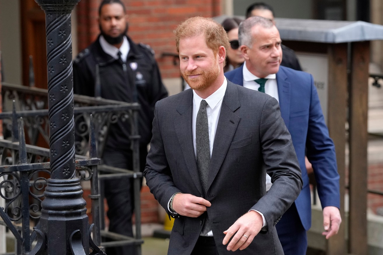 Harry's lawyer says the prince may be forced to settle his claim against The Sun's publisher. 