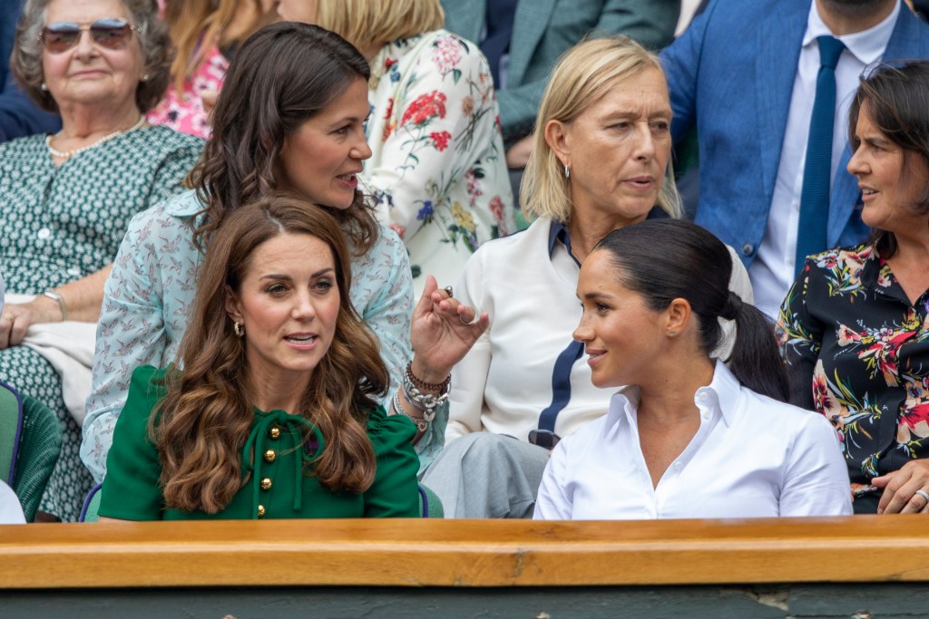 Pictured is Princess Kate and Meghan Markle