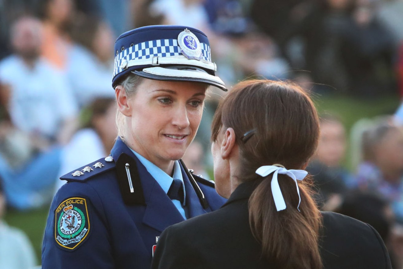 Inspector Amy Scott (centre) will be commended for her bravery in ending the Bondi stabbing attack.