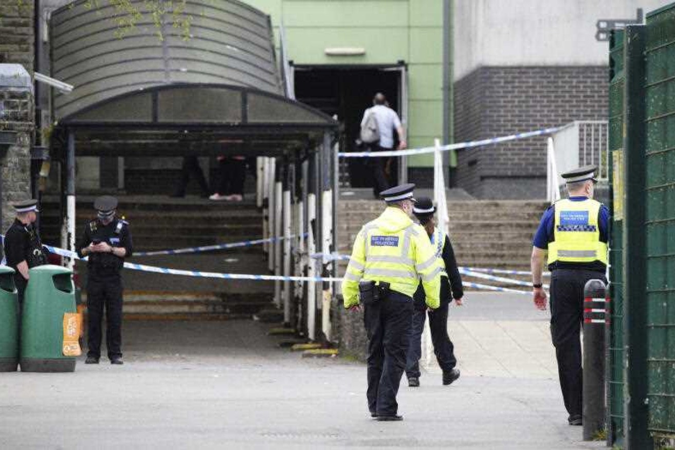 Police in Wales say a teenager has been arrested after three people were injured at a school.