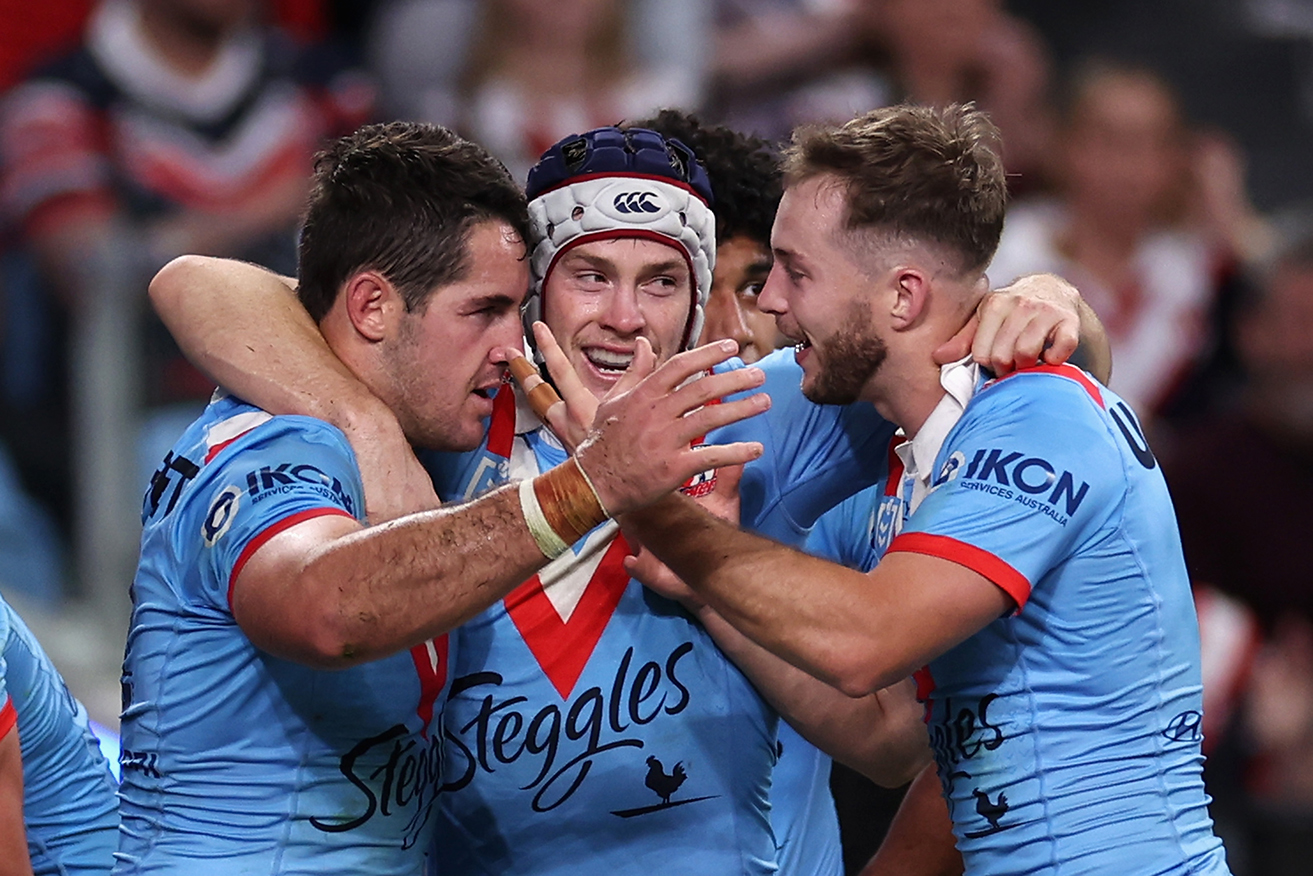 Luke Keary, Nat Butcher and Sam Walker celebrate a Sydney Roosters try at Allianz Stadium on Thursday.