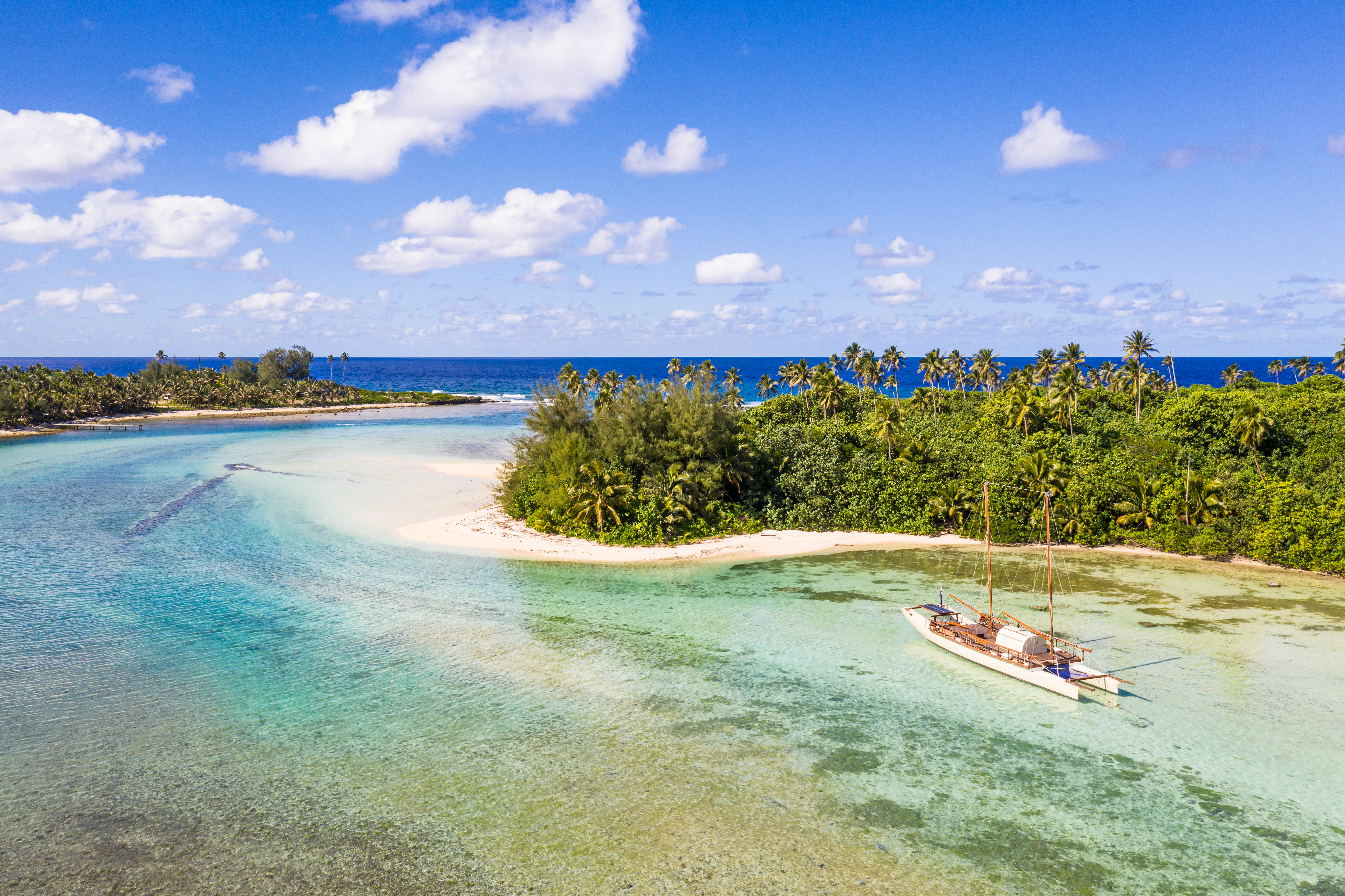 Sailboat in the idyllic Muri lagoon in Rarotonga in the Cook islands in Polynesia south Pacific