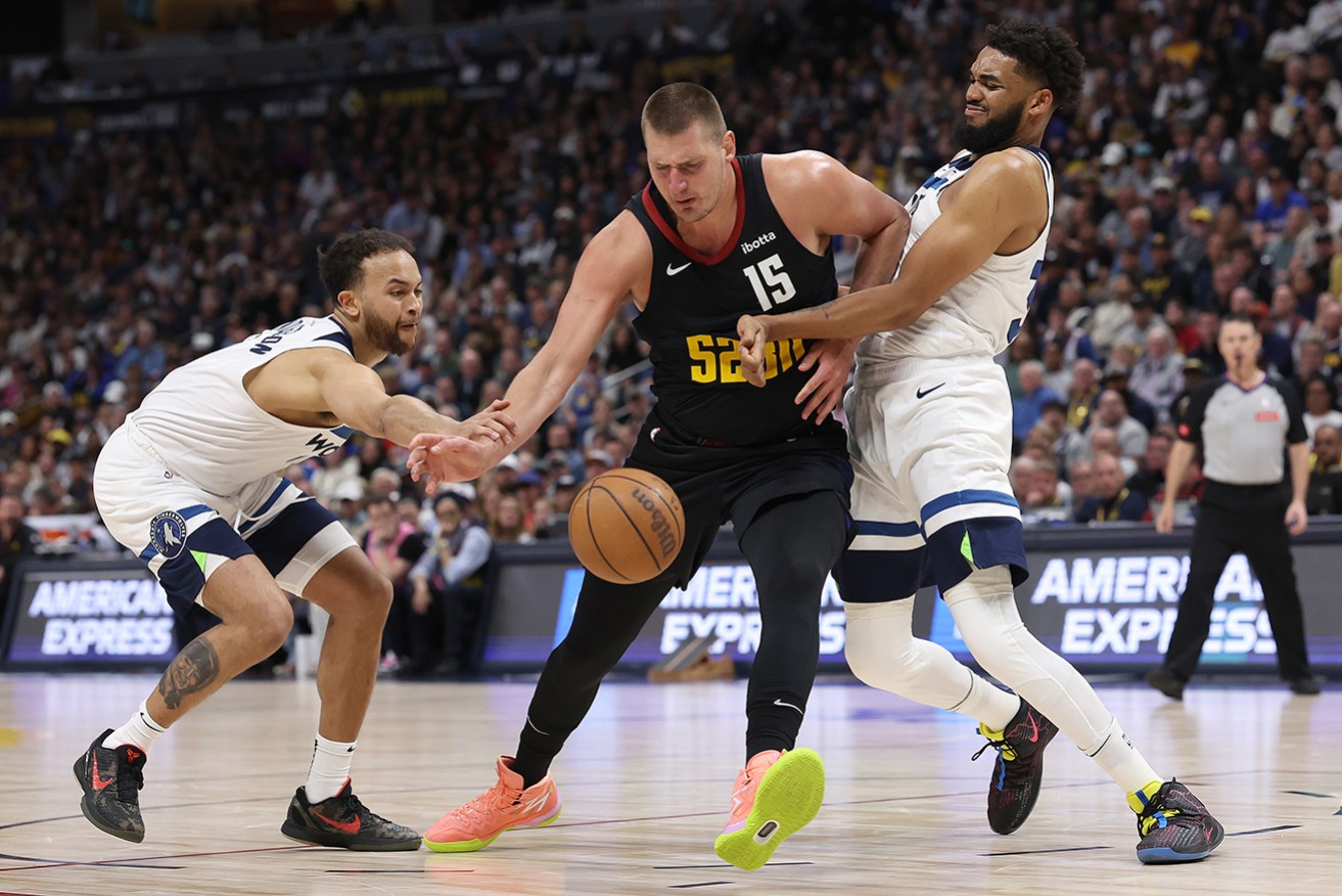 Denver Nuggets centre Nikola Jokic (middle) has again been voted the NBA's most valuable player. 