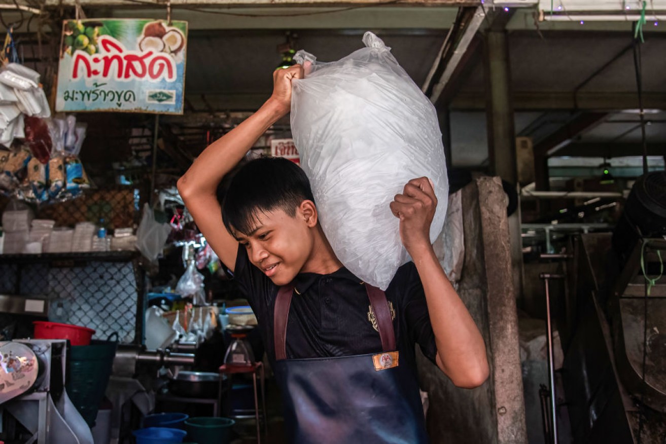 Ice is at a premium at Khlong Toei market during Bangkok's heatwave. 