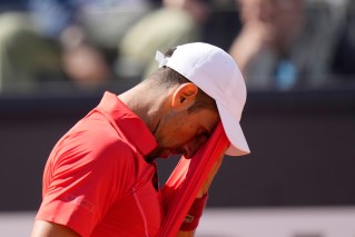 Djokovic blames Rome exit on flying bottle