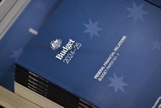 PM backs budget despite lukewarm response