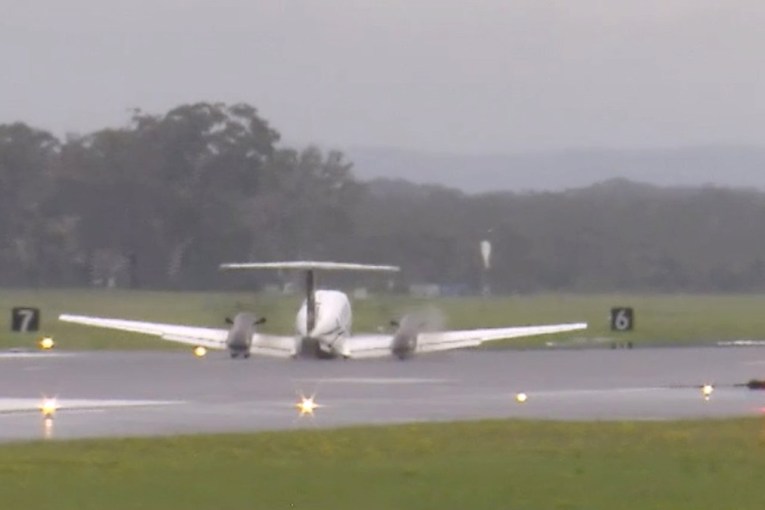 Passenger plane lands safely after landing gear failure