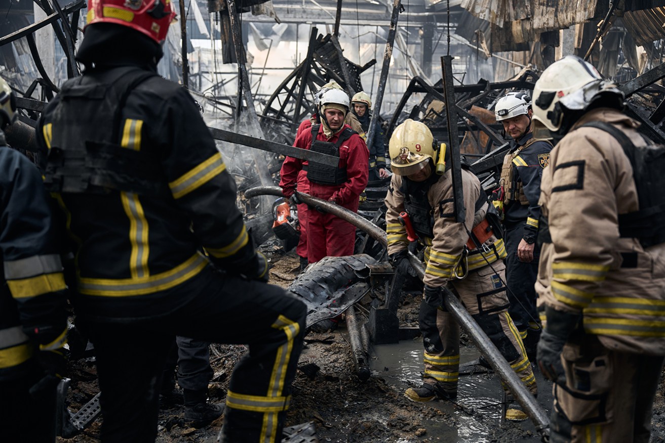Two guided Russian bombs hit a DIY hypermarket in a deadly strike on Ukraine's Kharkiv.