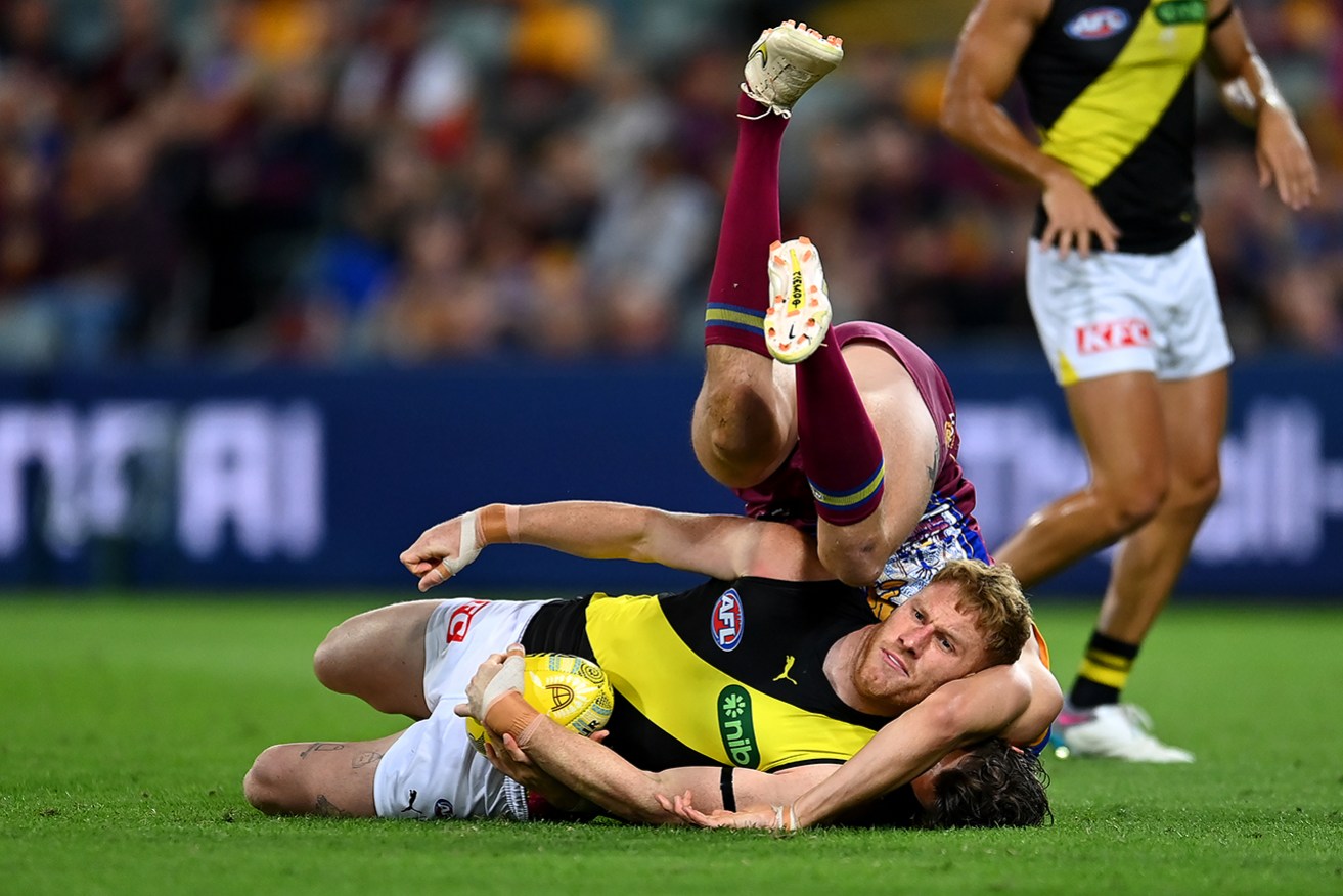 A new interpretation to the holding-the-ball rule will come into effect in round 12.