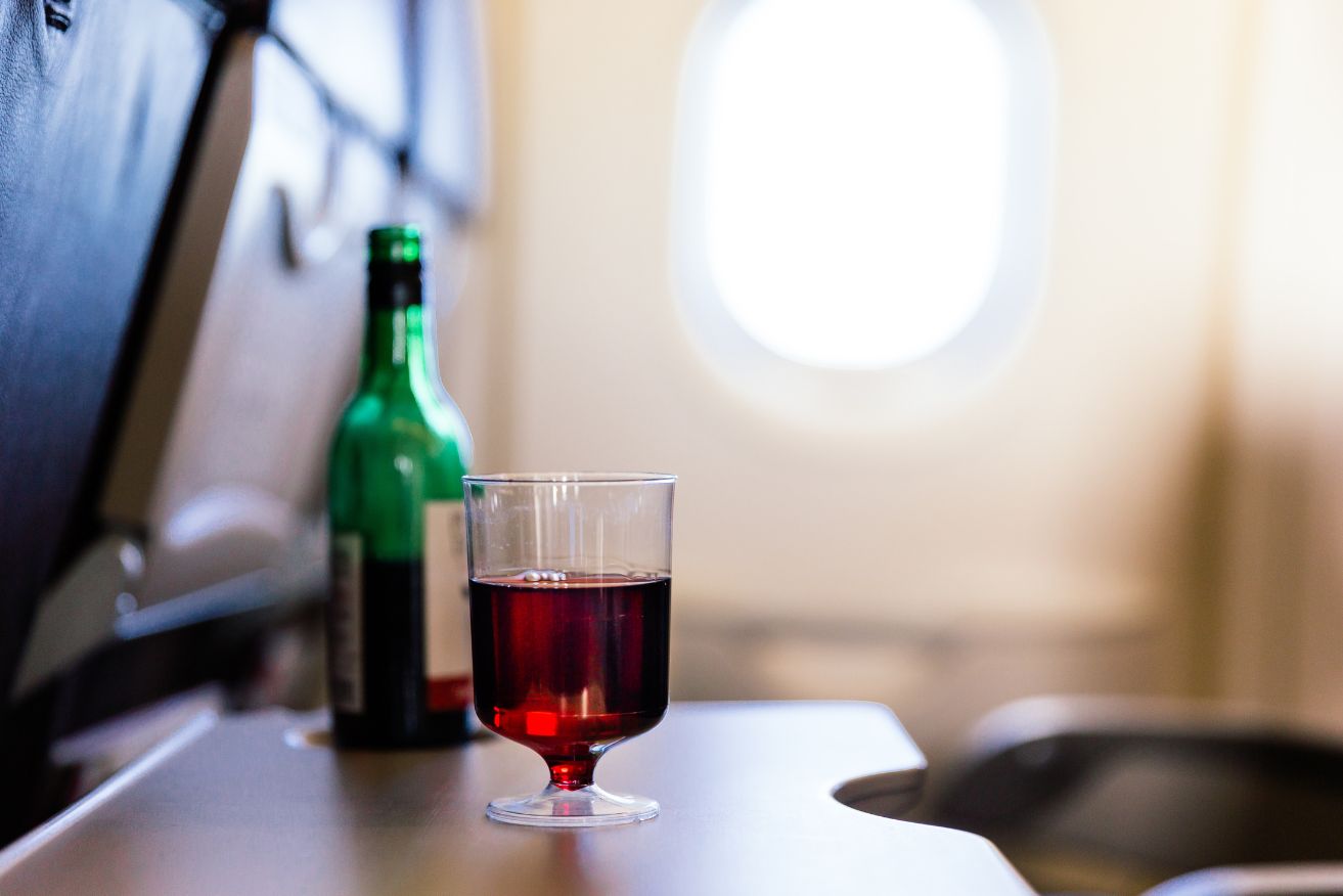 Drinking alcohol and then sleeping on a plane is a dangerous combination.