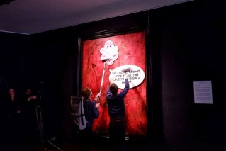 Protesters target King’s new portrait in London gallery