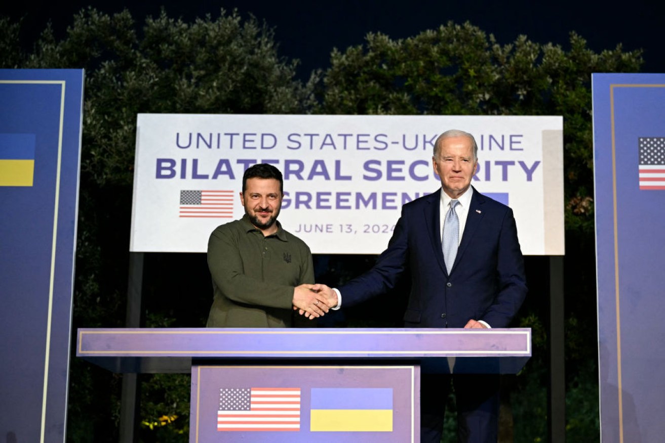 US President Joe Biden and Ukrainian President Volodymyr Zelensky announce the security deal on the sidelines of the G7 summit.