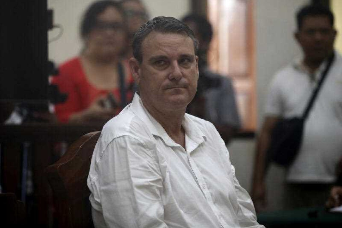 Indonesian authorities have reduced Troy Smith's initial charge of drug trafficking to drug use.