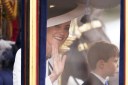 Princess all smiles for crowds and a dancing Louis