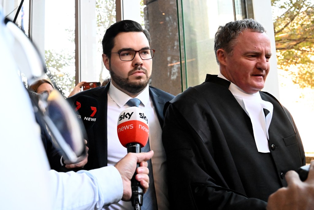 Bruce Lehrmann (left) departs the Federal Court of Australia in Sydney, Monday, April 15, 2024. Federal Court Justice Michael Lee has found Bruce Lehrmann most likely raped Brittany Higgins in Parliament House, losing the 28-year-old a defamation lawsuit brought against Network 10.