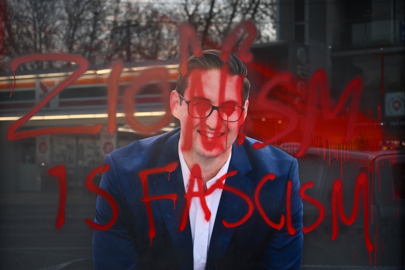 Two teenagers have been charged with criminal damage over an attack on Labor MP Josh Burns' office.